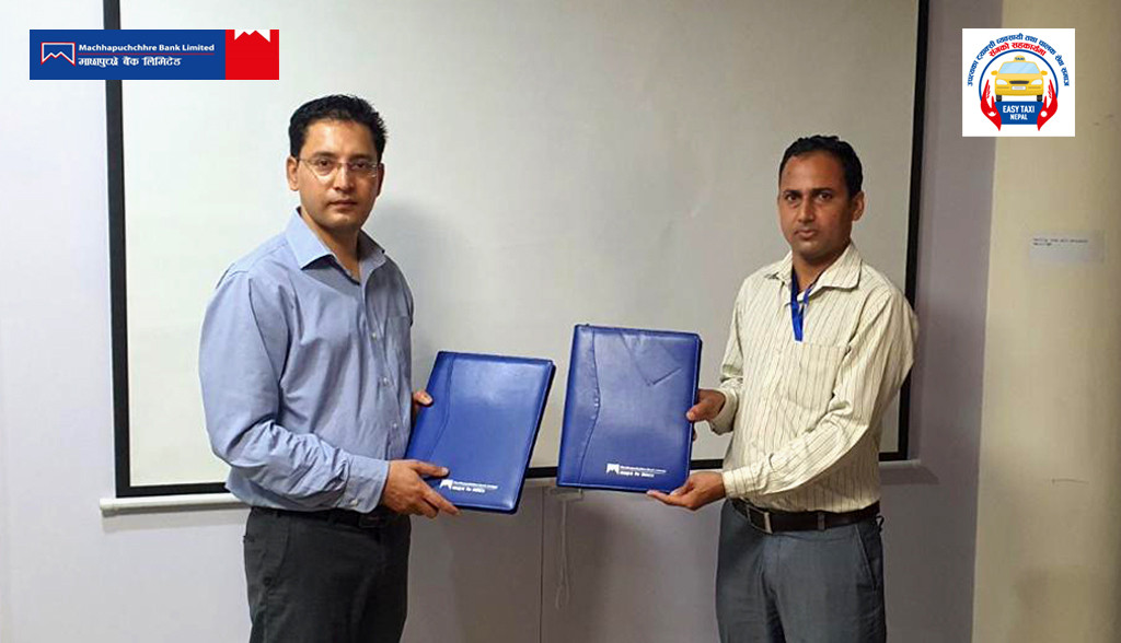 इजी एस्योरेन्स र माछापुच्छ्रे बैंकबीच विद्युतीय प्रणालीमार्फत ट्याक्सी भाडा भुक्तान गर्ने सम्झौता